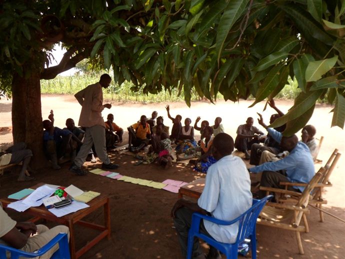 Group members of ‘Kica Ber’ (meaning ‘Being Kinds is Good’) collaboratively identifying their priority problems. Group members of ‘Kica Ber’ (meaning ‘Being Kinds is Good’) collaboratively identifying their priority problems.